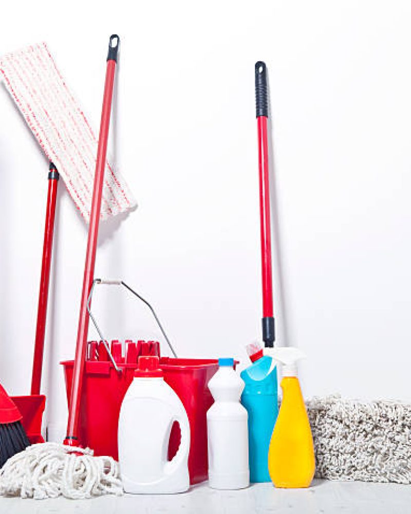 Household cleaning supplies standing in the living room
